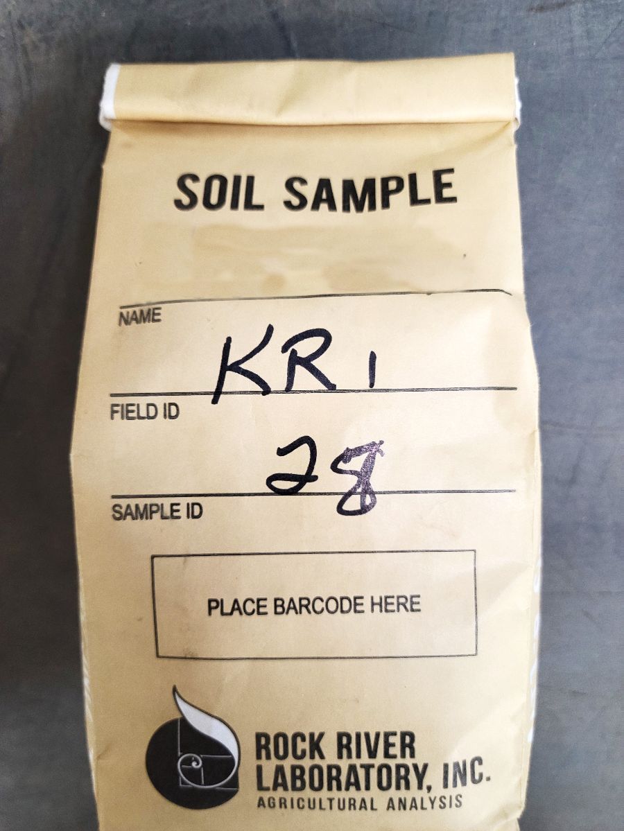 Soil sample bag with unclear handwriting